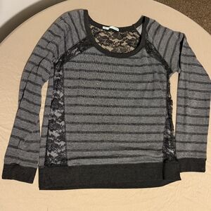 Black and Gray sweater. Large. Brand is Maurices.
